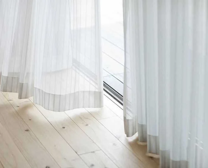 Оптимальная длина для подгиба штор в спальне